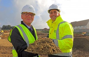 Cllr Philip Edge left and Paul LeGrice of Abel Homes cut the first sod at East Harling sm