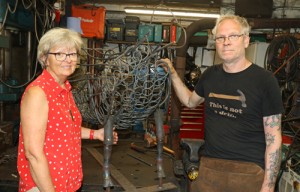 Maggie Abel of Abel Homes and Nigel Barnett of Fransham Forge with the frame for the sheep sculpture 500px