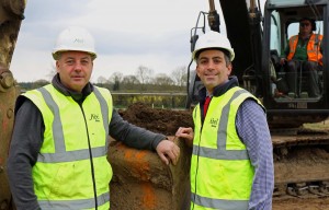 Robert Loudoun left and Paul LeGrice of Abel Homes dig the first sod at the site of 40 new homes in Bawdeswell sm