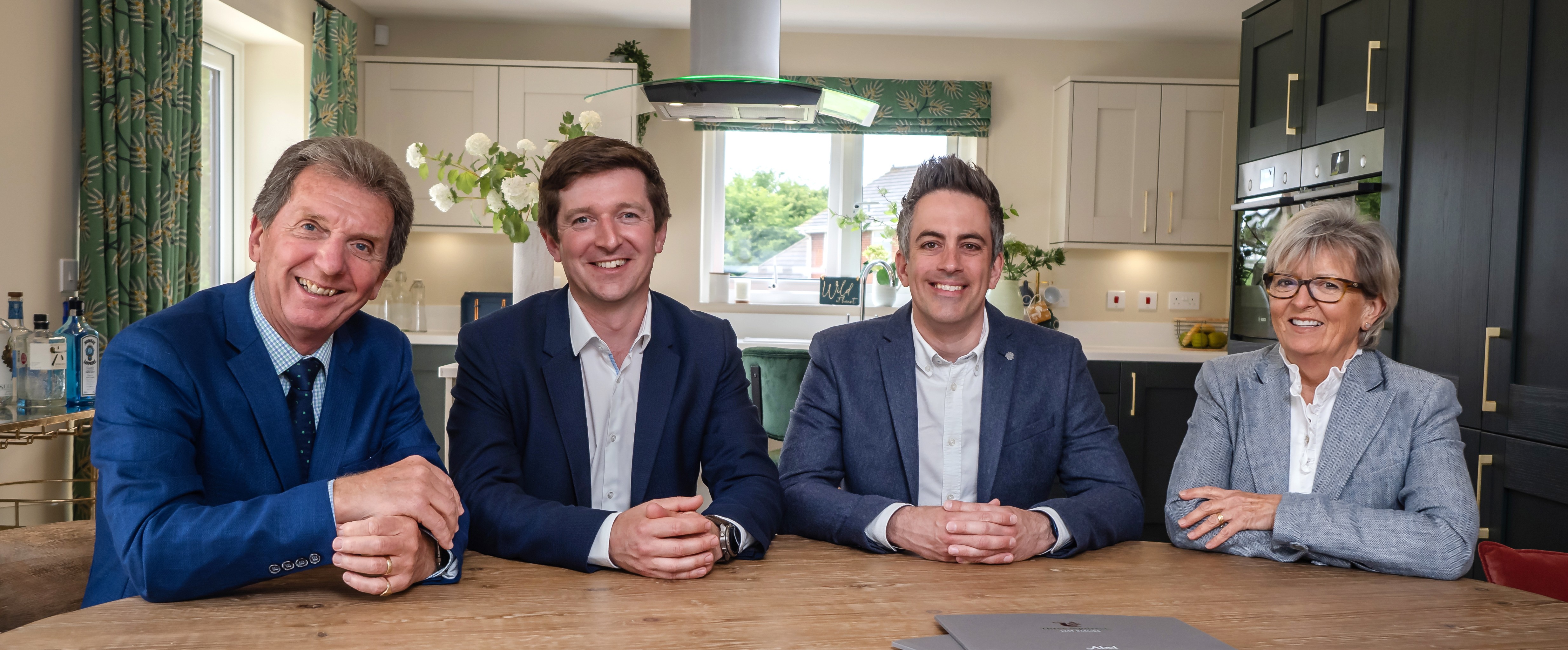 Abel homes directors team photo (Tony Abel, Christopher Abel, Paul LeGrice, Maggie Abel). 