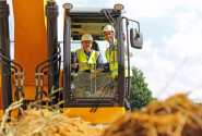 Little Melton Parish Council chair John Heaser cuts the first sod helped by Paul LeGrice of Abel Homes sm2