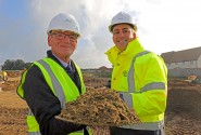 Cllr Philip Edge left and Paul LeGrice of Abel Homes cut the first sod at East Harling sm