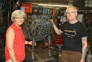 Maggie Abel of Abel Homes and Nigel Barnett of Fransham Forge with the frame for the sheep sculpture 500px