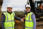 Robert Loudoun left and Paul LeGrice of Abel Homes dig the first sod at the site of 40 new homes in Bawdeswell sm