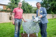 Tony Abel of Abel Homes right and Nigel Barnett of Fransham Forge with the new sheep sculpture in Watton 500px