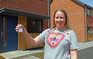 Catherine Smith with the keys to her new home at Rokeles Green in Watton sm