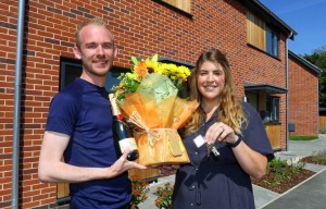 Dan Ashton receives the keys to his new home from Kirstie Barber of Abel Homes 1 sm