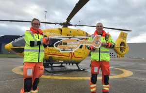 EAAA crew members Dr Joanna Stevens and CCP Rod Wells celebrate the 10000 donation from Abel Homes