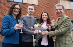 Mike Bunn and Emma Wright receive their keys from Tony Abel right and Clare Cornish left of Abel Homes 500