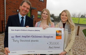 Sophie Mayes right from The Nook Appeal receives a cheque for 30000 from Tony Abel and Kim Macey of Abel Homes sm